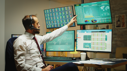 angry-businessman-throwing-graphs-in-the-air